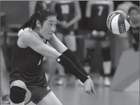  ?? Associated Press ?? Volley: China's Zhu Ting controls the ball during a women's semifinal volleyball match against the Netherland­s at the 2016 Summer Olympics in Rio de Janeiro, Brazil. A towering volleyball player who makes her living in Turkey is the unrivalled star of China's squad at the Asian Games in Indonesia.