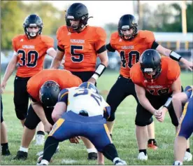  ?? PILOT PHOTO/RON HARAMIA ?? The Laville defense will see this picture a lot Friday as Culver relies on its running game, including Blake Thompson (30), Justin Fisher (5) and Shane Shuman (40).