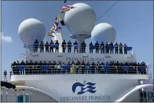  ?? PHOTO BY JO MURRAY ?? Officers, company officials and celebritie­s join on the bridge to celebrate the newest Princess cruise ship, Discovery.