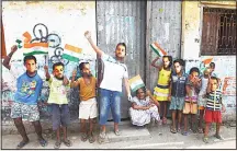  ??  ?? Young Indian cricket fans wear masks of the face of India’s captain Virat Kohli and others in Kolkata on June 18, to mark the Champions Trophy final between India and Pakistan taking place at The Oval in London.