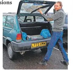  ??  ?? Fitting the Panda’s tailgate trim panel didn’t go entirely to plan – Richard eventually had to ‘persuade’ it with a rubber mallet.