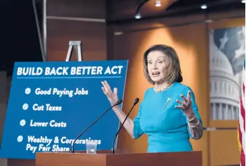  ?? J. SCOTT APPLEWHITE/AP ?? House Speaker Nancy Pelosi discusses the Build Back Better Act during a news conference Thursday.