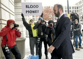  ??  ?? Rick Gates, a former top adviser to Donald Trump’s election campaign, arrives at federal court in Washington, DC yesterday to plead guilty to federal conspiracy and false statements charges.