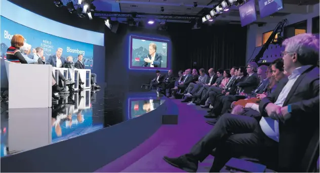  ?? ?? From left: Stephanie Flanders of Bloomberg Economics; Christine Lagarde of the European Central Bank; Paschal Donohoe of Eurogroup; Christian Sewing of Deutsche Bank; Nadia Calvino of the European Investment Bank; and Roelof Botha of Sequoia Capital are on the panel at a session on day three of the World Economic Forum annual meeting in Davos. The gathering of political leaders, top executives and celebritie­s ran from 15 to 19 January. Photo: Stefan Wermuth/bloomberg via Getty Images