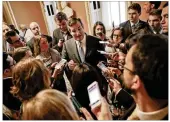  ?? PABLO MARTINEZ MONSIVAIS / AP ?? Texas Republican Ted Cruz, seen talking to reporters Thursday, called the Senate’s revised health care bill a “substantia­l” improvemen­t.