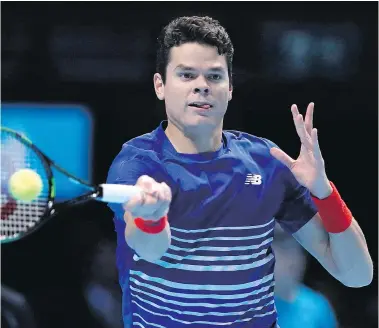  ?? — AP FILES ?? Milos Raonic of Canada sends a return to Andy Murray of Great Britain during their ATP World Tour Finals semifinal at the O2 Arena in London, Nov. 19. Raonic led a successful 2016 campaign for Canadian tennis by rising to the world No. 3 ranking.