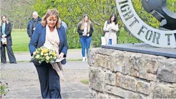  ?? ?? Wreath laying Fiona Hyslop MSP