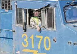  ?? Associated Press file photo ?? The vast majority of workers of the seven major rail carriers in the United States do not have paid sick leave, according to railroad analyst Tony Hatch.