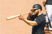  ?? ROB CARR/GETTY ?? Chris Davis says he’s still engaged and having fun despite not having an open lane to an everyday role with the Orioles.