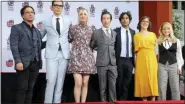  ?? PHOTO BY WILLY SANJUAN/INVISION/AP, FILE ?? In this file photo, Johnny Galecki, from left, Jim Parsons, Kaley Cuoco, Simon Helberg, Kunal Nayyar, Mayim Bialik and Melissa Rauch, cast members of the TV series “The Big Bang Theory,” pose at a hand and footprint ceremony at the TCL Chinese Theatre in Los Angeles.