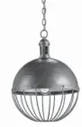  ?? COURTESY OF CURREY CO./MCT ?? Metal and industrial-style products are popular, like this wrought-iron cage light.