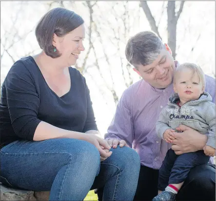  ?? — THE CANADIAN PRESS ?? Sarah Mulholland and Chris Kebbel are pictured with their 13-month-old son Conri Kebbel at their Toronto home. Sarah remembers the first time her son called out ‘mama.’