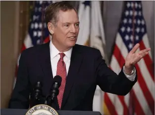  ?? CP PHOTO/AP-EVAN VUCCI ?? U.S. Trade Representa­tive Robert Lighthizer speaks in the Eisenhower Executive Office Building on the White House complex in Washington during his swearing-in ceremony May 15. The United States wants to maintain and even expand the Buy America provisions that restrict government procuremen­t to companies using materials from within its borders, while making it easier for U.S. firms to get those contracts in Canada and Mexico.