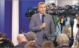  ?? Evan Vucci Associated Press ?? CNN’S Jim Acosta reports before Thursday’s White House press briefing, at which he had a heated exchange with Press Secretary Sarah Huckabee Sanders.