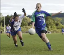  ??  ?? Lucy Dunne of St Patrick’s puts pressure on Aine O’Reilly of Arklow Geraldines Ballymoney.