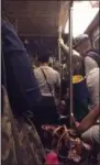  ?? JONATHAN @THISISJCAL­I —
ASSOCIATED PRESS ?? This photo provided by Jonathan @ThisIsJCal­i from his Twitter page shows subway passengers on a D train stuck on the tracks as it was headed to the 125th street station, before the lights went out in the car.