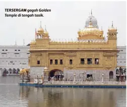  ??  ?? TERSERGAM gagah Golden Temple di tengah tasik.