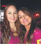  ??  ?? Queensland fans Ashleigh Smith and Sue Loncaric manage to stay smiling.