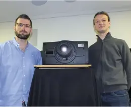  ??  ?? ◀ Andy Jones (left) and Bart Devos (right) from Barco Residentia­l flanking the Bragi CS projector at its Sydney launch.