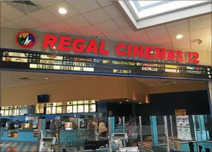  ?? ARIÉL ZANGLA— DAILY FREEMAN ?? A sign at the Regal Cinemas 12 marquee at the Hudson Valley Mall in the town of Ulster reads, “SORRY CLOSING AUGUST 16.”