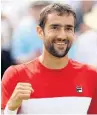  ??  ?? IN THE FINAL: Marin Cilic celebrates his win at Queen’s