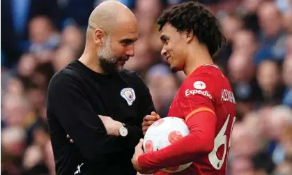  ?? ?? Pep Guardiola and Trent Alexander-Arnold chat on the touchline in April 2022. Photograph: Martin Rickett/PA