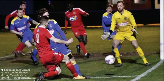  ?? JOHN DRISCOLL ?? Skelmersda­le United attack the Bootle ogal during Tuesday’s cup defeat