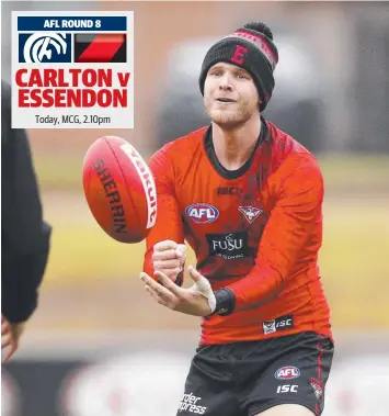  ?? Picture: DANIEL POCKETT ?? RUGGED UP: Essendon’s Michael Hurley warms up at a light training session yesterday ahead of the clash with Carlton.