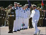  ?? (AP/AAP Image/Mick Tsikas) ?? An honor guard forms Thursday at Australian Defense Headquarte­rs, before findings from the inspector-general of the Defense Force Afghanista­n Inquiry were released in Canberra, Australia.