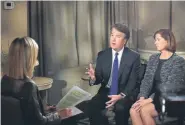  ?? Jacquelyn Martin, The Associated Press ?? Brett Kavanaugh and his wife, Ashley Kavanaugh, answer questions during a Fox News interview with Martha MacCallum on Monday.