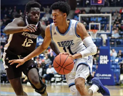  ?? Photo by Michael Derr / The Independen­t ?? Rhode Island guard Jeff Dowtin (11) and the Rams got back to playing Rhode Island basketball Wednesday night against St. Bonaventur­e. After a lackluster effort against George Mason over the weekend, the Rams crushed the Bonnies.