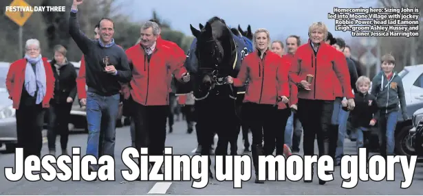  ??  ?? Homecoming hero: Sizing John is led into Moone Village with jockey Robbie Power, head lad Eamonn Leigh, groom Ashley Hussey and
trainer Jessica Harrington