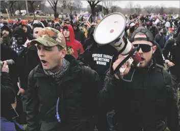  ?? AP PHOTO/CAROLYN KASTER, ?? Proud Boys members Zachary Rehl (left) and Ethan Nordean, left, walk toward the U.S. Capitol in Washington, in support of President Donald Trump, in 2021.