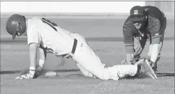  ?? Lethbridge Herald photo by Tijana Martin ?? Ryan Pouwells of the Lethbridge Bulls slides safely to second past Nicola Mislinski of the Brooks Bombers during a game at Spitz Stadium on Thursday. @TMartinHer­ald