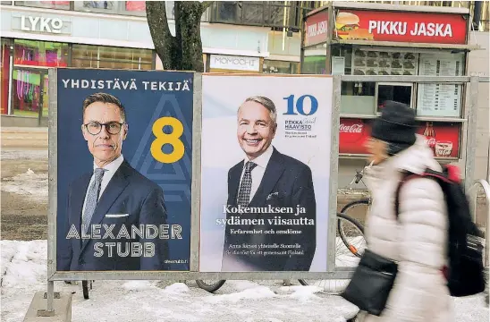  ?? EFE ?? Carteles electorale­s de Alexander Stubb y Pekka Haavisto en Helsinki