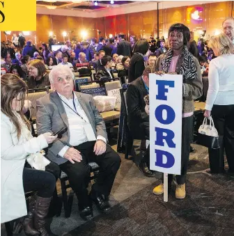  ?? CHRIS YOUNG / THE CANADIAN PRESS ?? A crowd waits to hear the results of the Ontario Progressiv­e Conservati­ve leadership race on Saturday. After a day mired in confusion and frustratio­n, Doug Ford emerged victorious, Chris Selley writes.