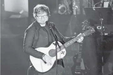  ??  ?? 017 Honoree Ed Sheeran performs at The Songwriter­s Hall of Fame 48th Induction and Awards Gala at the New York Marriott Marquis Hotel in Manhattan, New York, U.S., June 15, 2017. RE