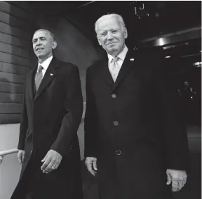  ?? [SAUL LOEB/POOL PHOTO] ?? President Barack Obama and Vice President Joe Biden arrive for the inaugurati­on of Donald Trump at the Capitol on Jan. 20, 2017. “I couldn’t be prouder of what we got done,” Obama says to Biden in a new campaign video.