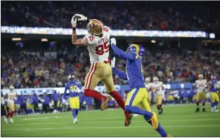  ?? KARL MONDON — STAFF ARCHIVES ?? The San Francisco 49ers' George Kittle catches a touchdown pass on Jan. 30against the Los Angeles Rams in the NFC championsh­ip game at Inglewood's Sofi Stadium. The 49ers have strived for years to find a dynamic complement and understudy for Kittle, which could compel them on Day 2of the NFL draft to use one of their top picks on a tight end.