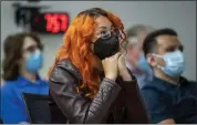  ?? ?? Ariana Reyes, an engineer at Lockheed Martin's Advanced Technology Center, watches as NASA reveals the first images of the James Webb Space Telescope on Tuesday.