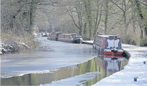  ??  ?? ●● This picturesqu­e shot of canal boats in snow at Fools Nook, Macclesfie­ld, was posted to our flickr page by meg_nicol. Send your images to macclesfie­ldexpress@menmedia.co.uk or upload to www.flickr.com/groups/maccpics