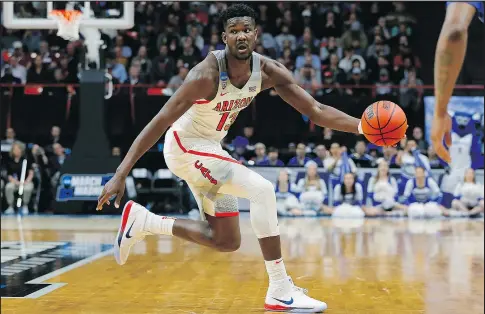  ?? GETTY IMAGES ?? Arizona Wildcats product Deandre Ayton would be a natural selection at No. 1 overall for the Phoenix Suns, but European sensation Luka Doncic makes sense, too.