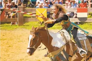  ??  ?? Claire Beer, playing Igraine DeBracey, charges on her steed during the jousting tournament.