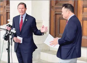  ?? Paul Schott / Hearst Connecticu­t Media ?? Sen. Richard Blumenthal, D-Conn., and Connecticu­t Attorney General William Tong speak Monday outside the state Capitol in Hartford in support of legislatio­n that would prohibit legal protection­s that the owners of Purdue Pharma are seeking to gain in bankruptcy court.