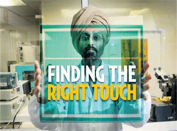  ?? MARIE-FRANCE COALLIER/ THE GAZETTE ?? Raja Tuli is the CTO of Datawind, a company that is the third-largest tablet seller in India. Tuli is holding a glass with a photoresis­t coating in a specialize­d lab at their Montreal facilities.