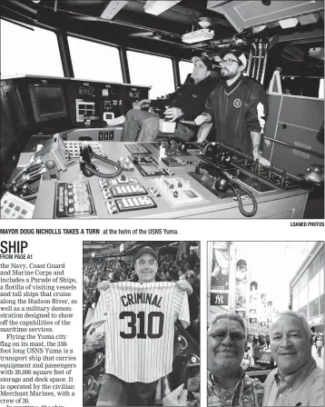  ?? LOANED PHOTOS ?? MAYOR DOUG NICHOLLS TAKES A TURN at the helm of the USNS Yuma.