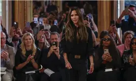  ?? Photograph: Vianney Le Caer/Invision/AP ?? Victoria Beckham accepts applause after her spring/summer 2024 womenswear fashion collection in Paris.