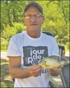  ?? Submitted photo ?? FISHING PRIZE: Stevie George, of Hot Springs, caught a $500 bluegill while fishing on Lake Hamilton over the weekend, the third fish caught in the 2018 Hot Springs Fishing Challenge.