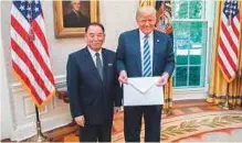  ?? Courtesy: Twitter ?? Donald Trump received a letter from North Korean leader Kim Jong-un on Friday. The letter was presented to him by North Korean special envoy Kim Yong-chol in the Oval Office at the White House.