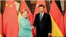 ??  ?? Angela Merkel y Xi Jinping: las relaciones comerciale­s han mejorado entre ambos países.